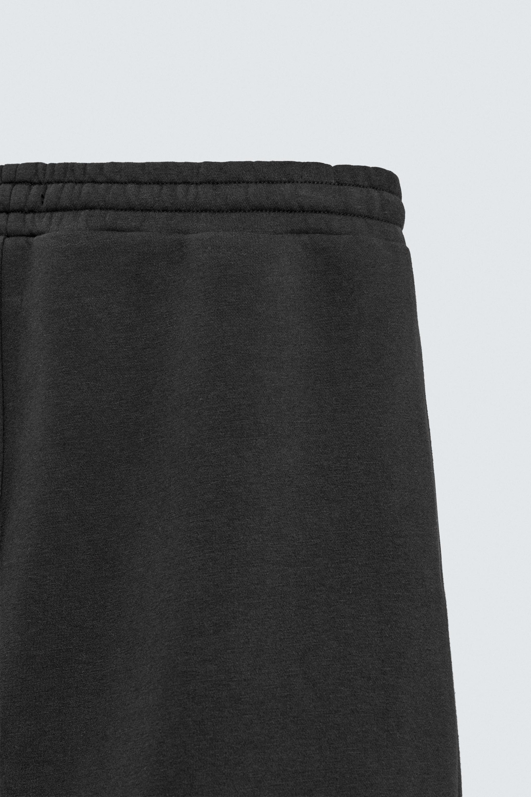 TECHNICAL PLEATED JOGGER PANTS